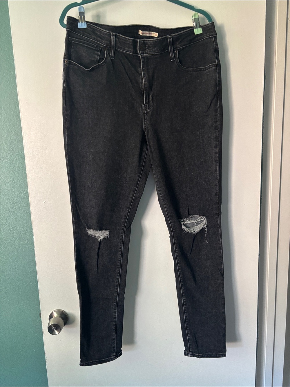 Levi’s 721 Black Skinny Distressed Jeans